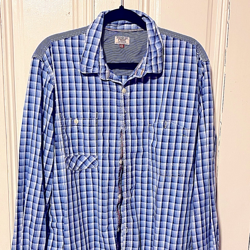 Great shirt for a night out; denim on the back upper shoulder is a great touch